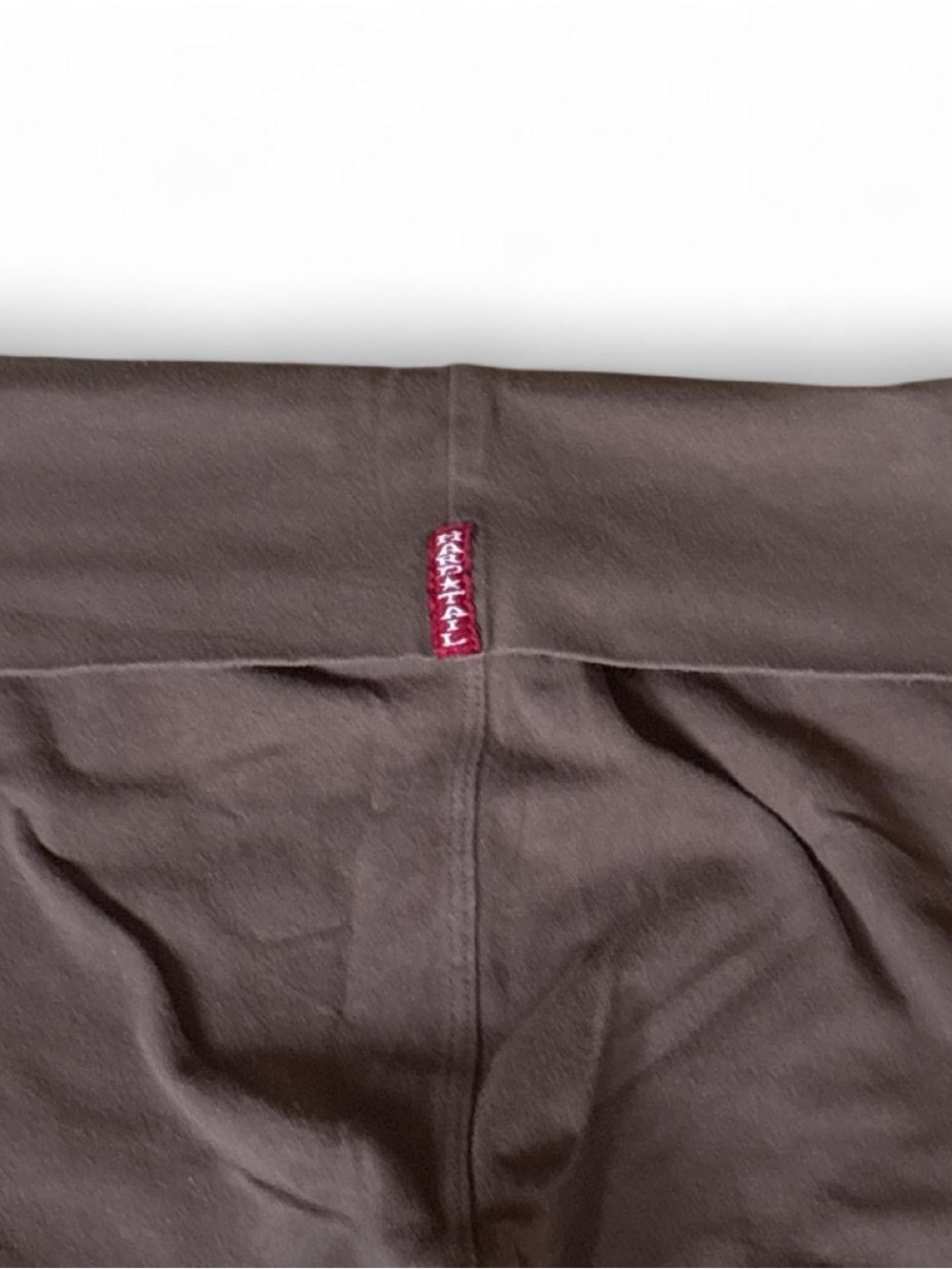 Hard Tail fold over crop legging with cut out fabric detail at bottom
